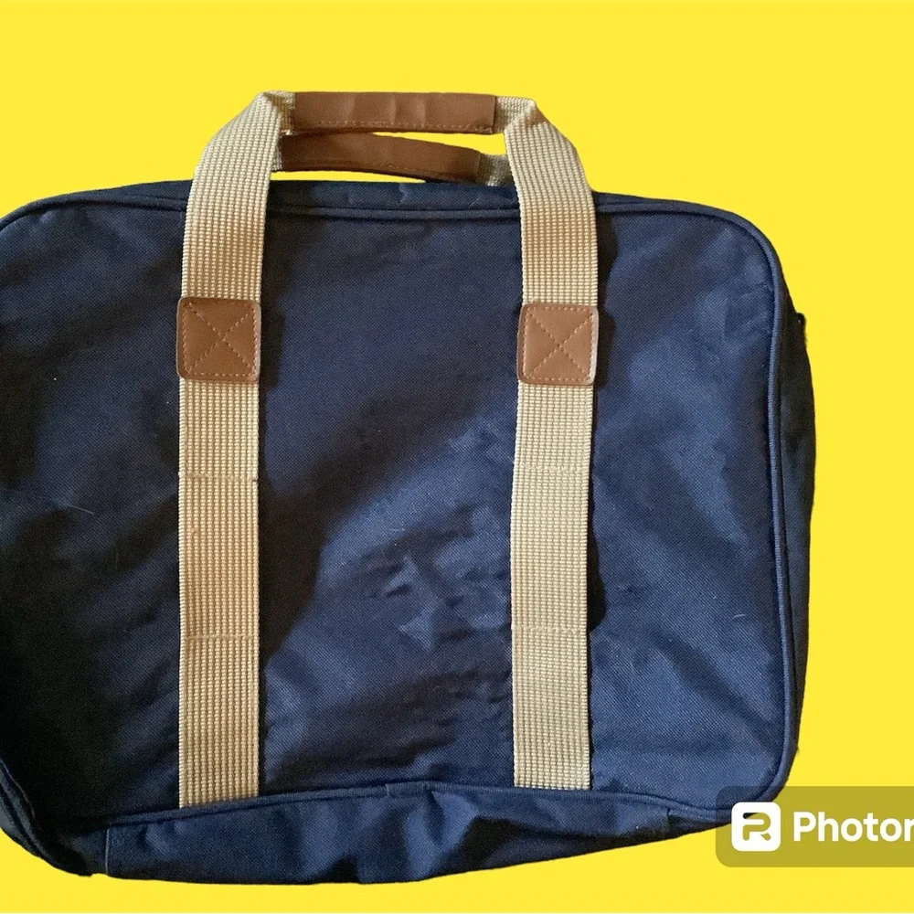 Lightweight Laptop bag. 1 large pocket inside & outside, 3 small pockets, NWT!